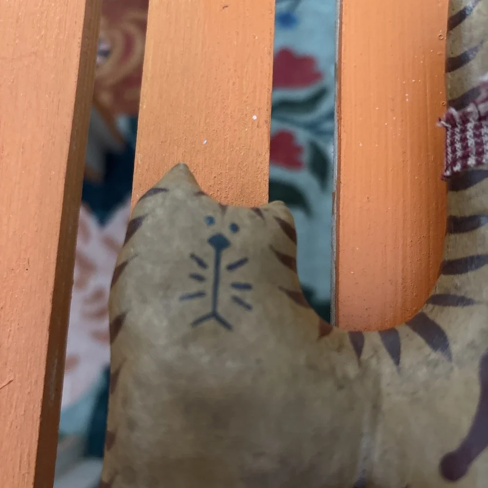 Folk Art Brown Cat Toy on Blue Wheels with Bow On Tail